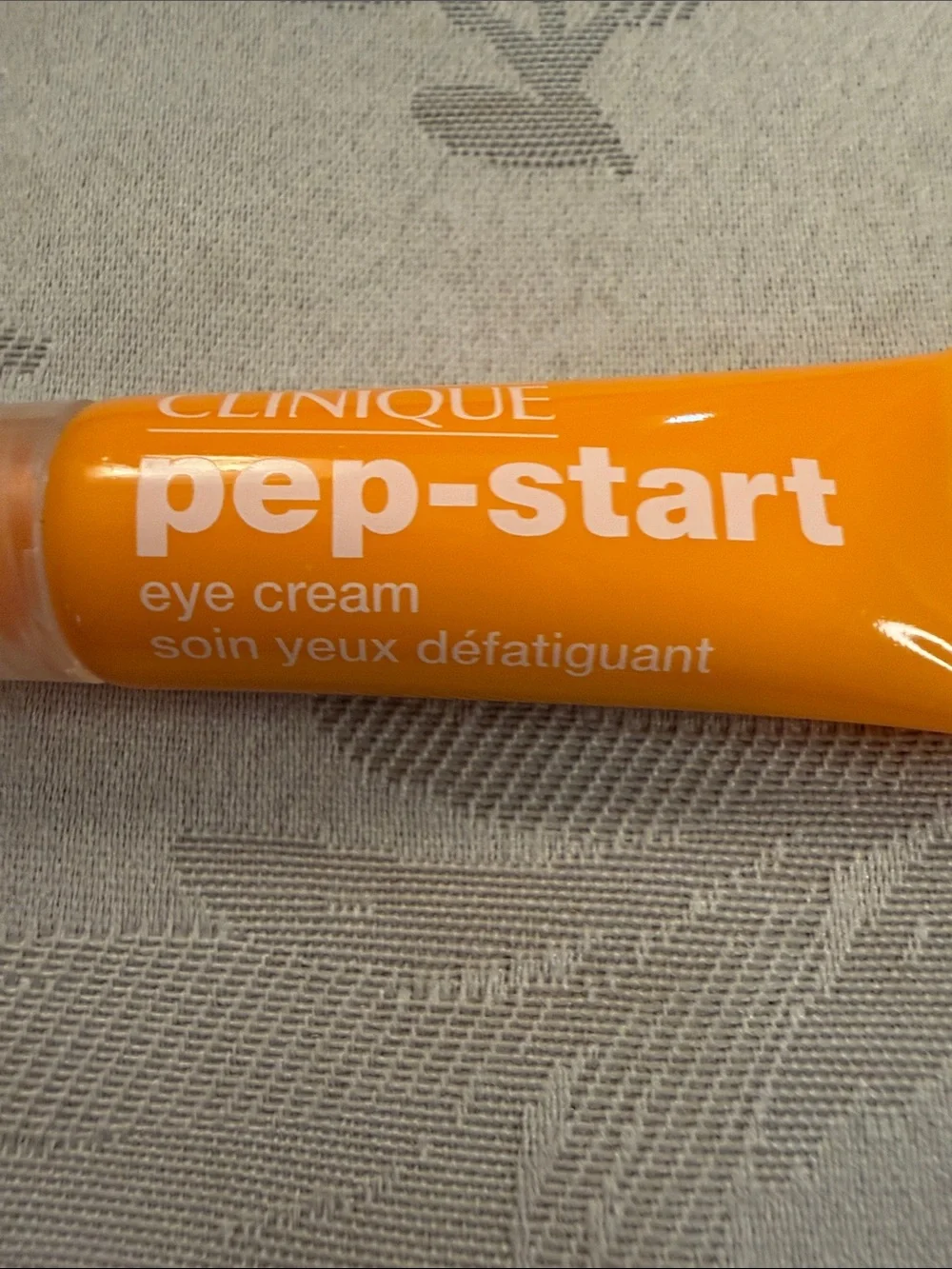 Clinique Yellow Cosmetic Pouch with Red Apple Print and Lip Balms